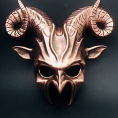 Embrace the mystique of ancient mythology with our Baphomet Horned Masquerade Mask. This bold and powerful design features intricate horn detailing and a striking golden finish, perfect for those looking to channel an air of dark majesty. Ideal for Halloween, themed events, or costume parties, this mask is sure to capture attention and spark intrigue with its mythical and ominous presence. Additional Product Details: Size/Type: One size fits most Mask Colors: Black and Gold Mask Material: High-q Kids Party Packs, Female Mask, Gold Mask, Mask Masquerade, Ancient Mythology, Masquerade Mask, Couple Halloween, Witch Hat, Kentucky Derby