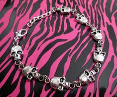 Buy any 2  Items and get a 3rd item at equal or lesser value FREE ! JUST ADD FREE ITEM YOU WANT  IN NOTE SECTION AT CHECKOUT .Buy any 2 jewelry items and get 3rd item at equal or lesser value FREE ! Skull link  Bracelet. Handcrafted out of Silver Plated Mixed Alloy Skull Charm pendants.   * Package: FREE Organza Gift Bag Handcrafted  In The U.S. Thank You For Visting Rebeltude ! Gothic Skull Print Bracelets As Gift, Halloween Punk Skull Bracelets, Alyssa Aesthetic, Goth Bracelets, Music Bracelet, Goth Biker, Biker Bracelet, Goth Accessories, Head Jewelry