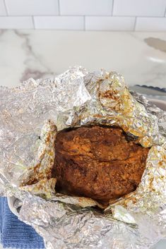 a loaf of bread wrapped in tin foil