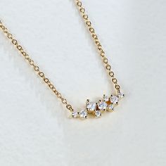 This necklace is characterized by its pendant portion, which consists of multiple moissanites in a unique cluster shape. Moissanite is a man-made gemstone with dazzling luster and sparkling fire that is almost as beautiful as a natural diamond. These sparkling clusters of moissanite create an eye-catching visual effect that will make you stand out on any occasion.   Stone Type: Moissanite  Carat Total Weight: 1.05 ct   Style: Modern  Chain Length: 16" with 2" extender (40+5cm)  Clasp Type: Lobster   Metal Material: Available for Gold Plated / 14k Solid Gold / 18k Solid Gold  Metal Color: Available in Rose Gold / Yellow Gold / White Gold Cotton Dress Indian, Sapphire Pendant Necklace, Sapphire Necklace Pendants, Moissanite Pendant, Dress Indian, Sapphire Pendant, Necklace White, Emerald Stone, Metal Material