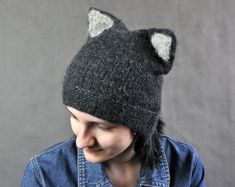 Looking for something for your animal loving friend? This lovely wolf hat or fox hat might be perfect for you! This hat with ears is hand knitted. Its made of very soft yarn - blow yarn, made of baby alpaca wool. Hat is very soft and warm. It will protect you before winter chill. One size - fit most Warm Cat Ears Hat, One Size Fits Most, Warm Cat Ears Hat One Size, Warm Cat Ears Hat One Size Fits Most, Winter Cat Ears Hat With Ears Detail, Novelty Cat Ears Winter Hat, Winter Novelty Cat Ears Hat, Handmade Casual Cat Ears Hat, Novelty Cat Ears Costume Hats For Winter, Animal Beanie