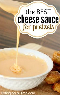 the best cheese sauce for pretzels is being drizzled over it