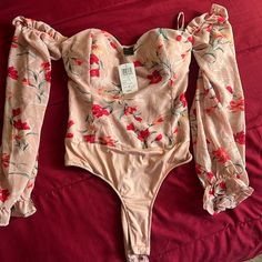 Mauve Floral Shirt Siza S Brand New Never Used Spring Printed Stretch Bodysuit, Spring Stretch Printed Bodysuit, Printed Stretch Bodysuit For Spring, Trendy Floral Print Bodysuit For Spring, Spring Party Tops With Lined Body, Casual Spring Tops With Lined Body, Spring Floral Print Bodysuit For Party, Floral Print Bodysuit For Spring Party, Spring Long Sleeve Printed Bodysuit