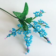 Forget me not flower French beaded flower  The price is for 1 flower stem  The length of the flower is approximately 13 in. These beautiful flower are made of Czech beads, strung on a wire wrapped with a masking tape. The flower of beads will remain beautiful for many years. The flowers will be a great addition to your decor or a great gift to a special day. Please note that the colors in the picture may differ slightly from the actual colors of the item due to the monitor settings. Each piece i Beaded Flowers Patterns, French Beaded Flowers, Forget Me Not Flower, Flower Artificial, Handmade Plant, Flower Stem, Crystal Tree, Beads And Wire, Czech Beads