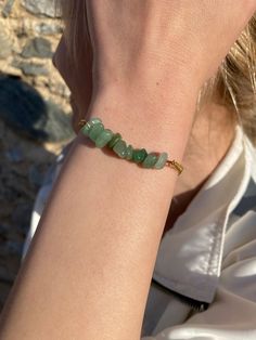 Aventurine Bracelet for Luck & Healing | Gift Box and Gift CardEmbrace luck and invite healing with this vibrant Aventurine bracelet. Known as the "stone of opportunity," Aventurine's shimmering green hues evoke a sense of optimism, good fortune, and renewal.This bracelet features genuine Aventurine gemstones, each one radiating with the energy of luck and positive possibilities. The adjustable design ensures a comfortable fit, allowing you to wear this piece as a daily reminder to embrace new o Green Hand Wrapped Beaded Bracelets As Gift, Adjustable Aventurine Beaded Bracelets For Spiritual Use, Adjustable Spiritual Aventurine Beaded Bracelets, Jade Beaded Bracelets With Natural Stones For May Birthstone, Green Natural Stone Bracelets For Healing, Green Onyx Bracelet Jewelry Gift, Green Onyx Bracelet For Gift, Green Healing Bracelets With Natural Stones, Green Amazonite Jewelry As A Gift