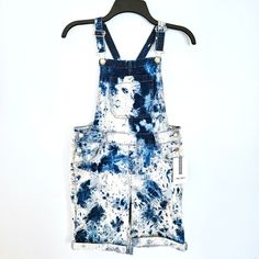 Brand New With Original Tags No Flaws Tie Dye Blue Denim Overalls With Bleached Design. Adjustable Straps Snap Button Sides Women's Size 12 Machine Washable With Like Colors Color May/Can Transfer To Other Fabrics - Wash Separately To Avoid Staining Has Pockets Measurements: No Bust 15 Inch Waist 29 Inch Length (With Adjustable Straps) 6.5 Inch Shorts Inseam Don't Like The Price? I'm Open To Reasonable Offers! Bleached Blue Jeans For Summer, Summer Bleached Denim Jeans, Blue Bleached Jeans For Summer, Summer Bleached Blue Jeans, Jean Short Overalls, Blue Denim Overalls, Distressed Overalls, Tie Dye Blue, Denim Overalls Shorts