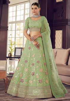 Pista green organza a line lehenga choli 9413 Desc: Style : A Line Lehenga Choli Color : Pista Green Fabric : Organza Work : Embroidery Wash Care : Dry clean Sleeve Style : Half Sleeve Long Sleeves : Done only in Custom Stitch Sleeves Lining : Done only in Custom Stitch Bust Size : 32 to 42 Inches Occasion : Wedding Mehendi Sangeet Engagement Reception Ceremonial Baby Shower. With Express Free Shipping Buy Indian Party wedding wear Bridal Lehenga Choli Pista green organza a line lehenga choli 94 Green Net Blouse Designs, Pista Green Lehenga Combination, Green Lehenga Combination, Lehenga Combination, Pista Green Lehenga, Organza Choli, Pista Colour, Net Blouse Designs, Lehenga Heavy