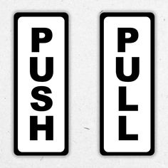 two black and white push signs with the word push written on one side, and the word push printed on the other