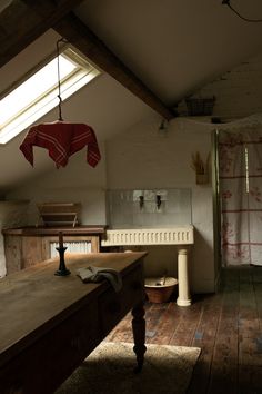 an old fashioned kitchen is shown in the attic