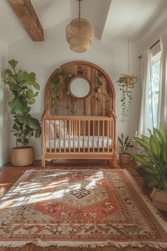 a baby crib in the middle of a room with potted plants on the floor