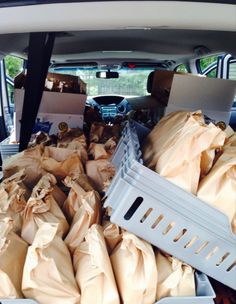 the back end of a car filled with boxes