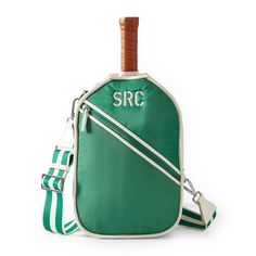 a green and white shoulder bag with the word src on it's side