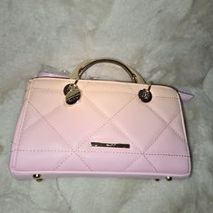 Aldo Bag Can Be Worn As A Crossbody Or A Satchel W Brass Handles. Bag Includes An I Side Zipper And A Large Slip Pocket. A Nice Size Open Compartment For Keys And Cell Phone. Crossbody Strap Is Also Included. This Bag Is Small But An Eye Opener For Sure. Retail $75 Pink Evening Bag With Adjustable Handle, Chic Pink Box Bag, Chic Pink Satchel With Adjustable Handle, Chic Pink Box Bag With Handles, Elegant Pink Satchel With Adjustable Handle, Pink Box Bag With Gold-tone Hardware For Shopping, Rectangular Pink Bag With Silver-tone Hardware, Pink Square Bag With Gold-tone Hardware, Pink Square Box Bag With Gold-tone Hardware