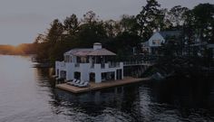 a house on a dock in the water