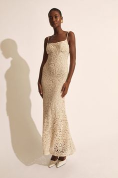 The Adoni Crochet Midi Dress is a textural, crochet design in a form-flattering silhouette with slim straps, a subtle scoop neckline and a softly flared hem. Finish with a neutral heel for a sophisticated look.

SIZING: True to size AU:.Model wears a size 8 / US: Model wears a size 4.

FABRICATION: Main: 100% cotton. Lining: 100% polyester. Exclusive of trims.

- Crochet detailing
- Slim straps
- Soft kick flare hem
- Scoop neckline
- Fully lined Crochet Dresses For Women, Corsets Fashion, Mum Jeans, Crochet Midi Dress, Crochet Midi, Day To Night Dresses, White Cocktail Dress, Crochet Design, Wide Jeans