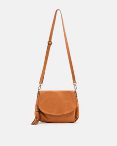 Beautiful in tan, the Vasarino crossbody leather bag is a glamorous piece that you should add to your wardrobe. Featuring a main compartment with a zippered closure, an internal zip pocket and a zip pocket at the back, this piece of art is made even more beautiful with bronze hardware and a tassel. Wear it using the adjustable strap and feel posh spice instantly.  20 cm high x 27,5 cm wide x 6 cm deep Adjustable shoulder strap (drop 60 cm) Matching stitching and bronze plated hardware Main compa Versatile Brown Crossbody Saddle Bag, Versatile Cognac Shoulder Bag With Detachable Strap, Leather Saddle Bag With Zipper Closure, Camel Bag With Adjustable Strap For Fall, Fall Camel Bag With Adjustable Strap, Fall Camel Bags With Adjustable Strap, Cognac Crossbody Flap Bag With Removable Pouch, Camel Crossbody Shoulder Bag For On-the-go, Brown Crossbody Saddle Bag With Zipper