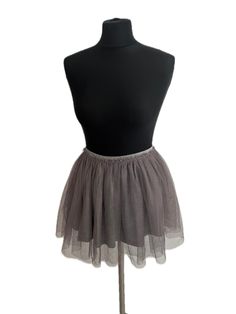 Gray tulle tutu skirt with silver glitter, silver glitter rubber waistband. Two layers of tulle and gray cotton lining. Size 11/12 Measurements: waist 60 cm,(23.62 in.) stretched elastic waist 80 cm,(31.49 in.) length 37 cm.(14.57 in.) We love vintage clothing and accessories, so all our items are carefully selected and in perfect condition.  Reuse, unique pieces of the past, giving them another chance and a new life. Do not hesitate to contact us if you need more information about an item we ar Gray Tutu, Tutu En Tulle, Tutu Ballet, Tulle Tutu Skirt, Dance Skirt, Tulle Tutu, Tutu Skirt, Gray Skirt, Grey Cotton