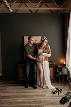 a man and woman standing next to each other