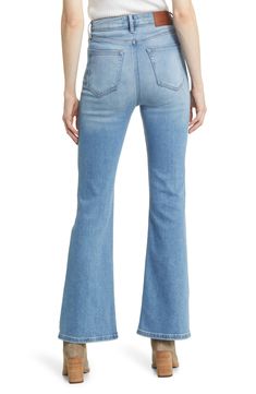 Cleanly styled for a casual-chic look, these light-wash flare jeans are made from stretchy denim with a high waist and full-length legs. 31" inseam; 11 1/2" front rise Zip fly with button closure Five-pocket style 93% cotton, 5% polyester, 2% spandex Machine wash, tumble dry Imported