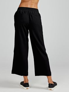 The Weekend Wide Leg Pant is your go-to choice for laid-back days. Crafted from lightweight fabric, it offers optimal comfort and freedom of movement. Its wide leg design ensures a relaxed fit, making it perfect for casual outings and leisurely strolls. With its versatility and effortless style, it's an essential addition to your wardrobe. It's also available with a longer 25" inseam. Versatile Wide Leg Pull-on Pants For Loungewear, Versatile Relaxed Fit Wide Leg Pants For Everyday, Wide-leg Yoga Pants With Pockets For Loungewear, Relaxed Bottoms With Elastic Waistband And Straight Hem, Versatile Cotton Sweatpants With Pull-on Style, Relaxed Pants With Ribbed Waistband And Straight Hem, Relaxed Stretch Wide-leg Sweatpants, Comfortable Pull-on Style Workwear Bottoms, Comfortable Pull-on Style Bottoms For Workwear