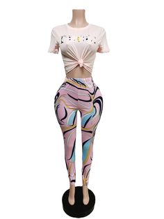 Take your attitude to a whole new level with this Pucci Graphic Two Piece Set. Featuring a soft spandex stretch material with a graphic crop top and matching abstract design high waist leggings, we are in love. Simply pair with minimal accessories, heels and wear with confidence. Trendy Spring Leggings For Streetwear, Trendy Spring Streetwear Leggings, Pink Stretch Activewear With Graphic Print, Trendy Spring Activewear With Graphic Print, Trendy Graphic Print Activewear, Spring Graphic Print Stretch Activewear, Spring Activewear With Graphic Print And Stretch, Spring Stretch Activewear With Graphic Print, Casual Fitted Bottoms With Abstract Print