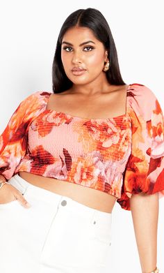 Romantic florals are the signature look in the Poppie Print Top. Highlighting a shirred back and bust to pull your waist and bust in, you'll want to wear it all year round. Key Features Include: - Square neckline - Back tie detail - Elbow-length elasticated puff sleeves - Shirred back and bust - Pull over style - Cropped length Team with a maxi skirt to keep the look modest and chic. | Plus Size Poppy Print Peach Top in Romance Floral, Size 14 | City Chic Plus Size Crop Top, Romantic Florals, Linen Shorts Women, Chic Plus Size, Peach Top, Corset Blouse, Cali Girl, Poppy Print, Plus Size Top