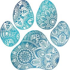 an animal's paw print with blue paisley patterns on the front and back of it