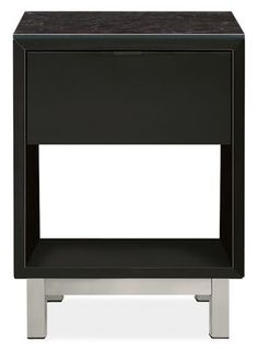 an end table with a black top and silver legs, on a white background photo