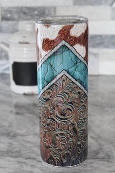 Leather, Teal and Cow Print Tumbler!  Available in 20oz or 30oz skinny tumblers. Lid and Straw included. *CARE INSTRUCTIONS ~Hand wash only ~Not dishwasher safe ~Do not microwave ~Do not soak OR freeze ~Do not leave in hot vehicles **Please note that each tumbler is hand made so no two tumblers will look exactly the same. Colors can vary depending on lighting and screens. Minor flaws or blemishes may be expected due to being hand made. **Want something you don't see? Message me with what you are wanting and I can see what I can do!  Thank you for visiting my shop  *Also find on Facebook www.facebook.com/AvamaeCreations Instagram: AvaMaeCreations Pinterest: www.pinterest.com/avamaecreations Best Tumblers, Horse Tumbler Ideas, Country Cups, Western Cups, Cow Print Tumbler, Cow Stuff, Tumbler Inspiration, Life Plans, Western Rings