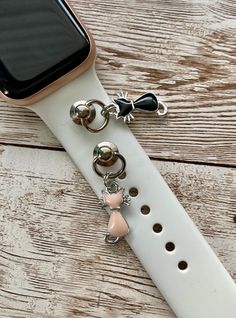 "These charms are the cat's meow. Check out these adorable silver toned cat watch band charms. Accessorize your watch band with this silver toned charm holder with colorful Kitty cat charm. This charm holder not only fits a variety of watch bands, it can be attached to purse straps, dog collars, phone cases, or any strap that has extra adjustment holes. These charm holders need a mini Phillips head screwdriver to attach them. Link to mini screwdriver: https://www.etsy.com/listing/939983557/mini- Case Charm, Leather Watch Cuff, Handmade Watch Bands, Charm Phone, Apple Watch Leather, Trendy Watches, Cat Watch, Colorful Cat