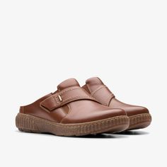 Womens Caroline Bay Tan Leather Mules | Clarks US Casual Leather Slip-on Sneakers For Walking, Casual Slip-on Clogs With Textured Sole, Cushioned Flat Slip-ons For Walking, Functional Synthetic Slip-ons With Round Toe, Comfortable Slip-on Clogs With Rubber Sole, Casual Slip-on Sneakers With Removable Insole For Walking, Comfortable Slip-ons With Removable Insole, Outdoor Slip-ons With Cushioned Footbed And Round Toe, Comfortable Cushioned Slip-ons For Everyday