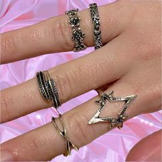 Brand Nwt. This Set Of 5 Antique Silver Metallic Rings Will Look Great On You! Transform Your Style With This Exclusive Set Of 5 Antique Silver Rings, Each Radiating A Unique Grunge Aesthetic. Perfect For Stacking Or Wearing Individually, These Rings Are An Ideal Accessory For Anyone Looking To Make A Bold Statement With Their Jewelry. Whether You're Heading To A Concert Or Just Want To Add An Edge To Your Everyday Look, This Set Of Rings Is Sure To Turn Heads And Resonate With Your Inner Rockst Mingi Aesthetic, Grunge Rings, Grunge Ring, Metallic Rings, Set Of Rings, Hand Rings, Antique Silver Rings, Dark Grunge, Magical Jewelry