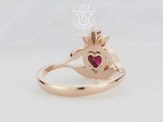 Claddagh ring with a Chatham created Ruby Nature inspired floral leaf and vine. Can also choose from several options of heart shaped gemstones from drop down menu. This is an original engagement ring design from our nature inspired collection that correlates with our floral leaf vine theme only available at 3DHeraldry. Ring Features: * Center Stone: 4mm Heart Faceted Chatham Created Ruby. This is a lab grown stone that has essentially the same optical, physical and chemical properties as a natur 14k Rose Gold Heart Cut Jewelry For Wedding, Elegant Heart Ring With Bezel Setting For Wedding, Original Engagement Rings, Claddagh Ring, Ring Ruby, Claddagh Rings, Ruby Engagement Ring, Womens Wedding Bands, Ruby Ring