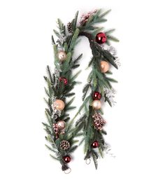 a christmas wreath with ornaments hanging from it's sides on a white background,