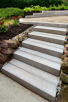 a set of steps leading up to a garden