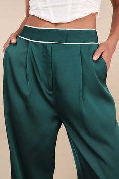 Playful and chic at the same time, the Lulus Sophisticated Step Emerald Satin Wide-Leg High-Rise Pants are essential for elevating your workweek looks! Sleek woven satin shapes these statement-making pants with a high waist, a hidden zip fly, and top clasp closures. White contrast piping accents the waist and wide legs, continuing down the side seams to ankle-length hems. Pleated details, functional front diagonal pockets, and a decorative back welt pocket complete the look. Fit: This garment fi Making Pants, Satin Pants, Chic Office, Contrast Piping, High Rise Pants, Wide Legs, Welt Pocket, Ankle Length, Piping