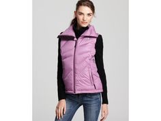 New The North Face Bella Luna Down Vest Insulated Jacket Purple XS 550 Fill New The North Face Bella Luna Down Vest Insulated Jacket Purple XS 550 Fill Click images to enlarge Description Whether you're exploring the backcountry or lounging around the lodge, insulate yourself against cold conditions with The North Face Bella Luna Down Vest. Extended collar protects your face from harsh exposure and is lined with a soft chin guard to eliminate discomfort caused by zippers rubbing against your skin.   Product Details Face Fabric 100% Polyester Pockets Two brushed tricot-lined, secure-zip hand pockets Additional Features Tall collar with brushed chin guard zips to cover lower face Hem cinch-cord Please note we are not authorized dealers with The North Face and product will not have any warran North Face Puffer Jacket, North Face Rain Jacket, North Face Vest, Women's Jackets, Down Vest, North Face Women, North Face Jacket, North Face, Rain Jacket