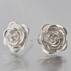 Rose Stud Earrings - Goldmakers Fine Jewelry Roses For Her, Original Jewelry Design, Rose Stud Earrings, Chevron Necklace, Silver Flower Earrings, Chevron Ring, Mission Statement, Original Jewelry, Sterling Silver Flowers