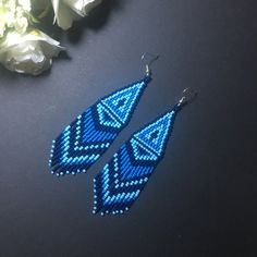 Blue Beaded Fringe Tassel Earrings For Festivals, Blue Fringed Beaded Earrings For Festival, Summer Blue Beaded Earrings With Tassels, Blue Bohemian Tassel Earrings For Summer, Bohemian Blue Tassel Earrings For Summer, Blue Beaded Fringe Tassel Earrings For Summer, Blue Beaded Fringe Earrings For Festival, Bohemian Blue Earrings With Beaded Fringe, Blue Tassel Earrings For Festivals