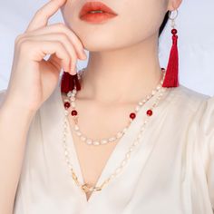 This Return to Origin pearl necklace set features multi-style natural baroque pearl lariat necklace with red silk tassels which can also be styled as earrings. Beaded baroque pearl necklace can be styled as rope necklace, lariat necklace, classic necklace, or even a bracelet. ⚜ Return to Origin Jade Beaded Necklace ❀ Natural Baroque Pearls 8-10mm❀ Red Carnelian 8mm❀ Gold Filled Link with Wire Wrapped Seed Pearls❀ Beaded Chain 42 in. with Glasses Chain Connectors❀ Multiple Styles ⚜ Red Silk Tasse Pearl Lariat Necklace, Jade Bead Necklace, Pearl Lariat, Silk Tassels, Red Carnelian, Pearl Necklace Set, Baroque Pearl Necklace, Classic Necklace, Carnelian Beads