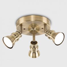 three light brass finish ceiling fixture