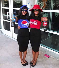 two women standing next to each other in front of a building holding soda cans and pepsi bottles