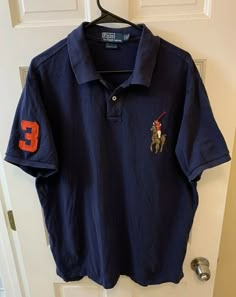 Polo Ralph Lauren Men XXL 2XL Blue Big Pony Logo Suede Beaded 3 Custom Fit RL Rare Lo Piece - Only one on eBay! Men’s Extra Extra Large - XXL - 2XL - Custom Fit - ~ 25.5” from armpit to armpit and ~ 29.5” from neckline to the front tail and 31” to back tail 100% Cotton Big Pony is suede leather, sewn on logo with Native American style beading Made in China Has a small spot on back shoulder and the bottom tail shows some wear - see pictures Shipped with USPS First Class. Vintage Polo Ralph Lauren Aesthetic, Polo Ralph Lauren Aesthetic, Polo Fits, Fitted Blue Ralph Lauren Polo Shirt, Baggy Clothes Outfit, Vintage Blue Polo Shirt, Ralph Lauren Tshirt, Classic Collared Ralph Lauren T-shirt, Ralph Lauren Menswear