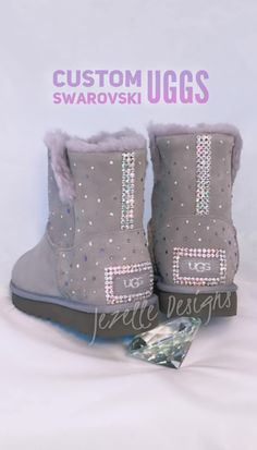 "LIMITED EDITION EXCLUSIVE Women's Authentic UGG® Boots Hand Jeweled by Jezelle Designs 💖   Make her feel extra special with aunique, personalized thoughtful gift.. Swarovski Crystal plush and cozy UGGS! 💖 BLING UGGS! The UGG® AUSTRALIA boot is one of the most plush, durable, and most luxurious pair of winter snow boots on the planet! ★ This listing is for the color - light lavender  ★ Crystal colors used are - tanzanite, AB, silver night, silver, purple. Message us if you prefer a personalized order. MORE DETAILS: 💎 Each boot heel will be hand \"crystallized\" with care and precision, one SWAROVSKI® crystal at at time. Each crystal is glued with the strongest adhesive available to provide a secure and permanent fit. OUR WORK: >We are perfectionists when it comes to our craft and our qu Glitter Ugg Boots For Woman, Luxury Silver Boots For Winter, Custom Uggs, Ugg Boots Short, Crystal Colors, Winter Schnee, Ugg Boots Australia, Bailey Bow Uggs, Bow Boots