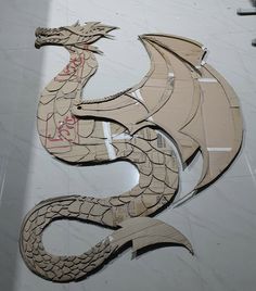 DIY cardboard dragon on Behance Dragon Box Diy, Diy Room Decor Cardboard, Diy Dragon Decor, Dragon Halloween Decorations, Dragon Room Ideas, Diy Cardboard Dragon, Recycled Animals, Cardboard Shark, Medieval Diy