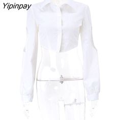 Shipping: Worldwide Express Shipping AvailableDelivery time: 🚚7-15Days Fast ShippingReturns: Fast refund,💯100% Money Back Guarantee.Brand Name: ZadilyFabric Type: BroadclothPattern Type: SolidFit Type: Regulai FitStyle: Sexy & ClubThickness: ThinOrigin: Mainland ChinaCN: GuangdongClothing Length: ShortMaterial: PolyesterElasticity: Non StrechDecoration: Hollow OutMaterial Composition: Synthetic fiberSleeve Length(cm): FullAge: 18-24Release Date: Autumn 2022Season: Autumn/WinterClothing Pattern Chic Fitted White Cropped Shirt, White Cropped Long Sleeve Shirt With Buttons, White Cropped Shirt With Long Sleeves And Buttons, Chic White Fitted Cropped Shirt, White Fitted Cropped Shirt Chic Style, Fitted White Cropped Shirt With Buttons, White Button-up Cropped Shirt, White Tops With Buttons For Night Out, White Fitted Crop Top With Buttons