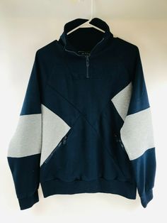 Retro Distrikt Men's Mock Neck Sweatshirt, 1/4 Zip Navy Blue White Pullover Sz L Good used condition Size: Large Questions are welcomed Color may vary slightly due to lighting Please Review all photos before purchasing Thanks for stopping by FREE Return! Blue Retro Sweater With Relaxed Fit, Retro Navy Long Sleeve Outerwear, Blue Retro Crew Neck Sweater, Vintage Blue Sweatshirt For Streetwear, Retro Blue Long Sleeve Sweater, Blue Cotton Half-zip Sweatshirt, White Mock Neck, Mock Neck Sweatshirt, White Pullover