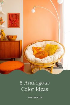 a living room with orange walls and furniture