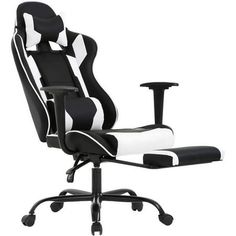 a black and white office chair with an arm rest on it's backrest