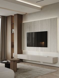 a living room with a large flat screen tv mounted on the side of it's wall